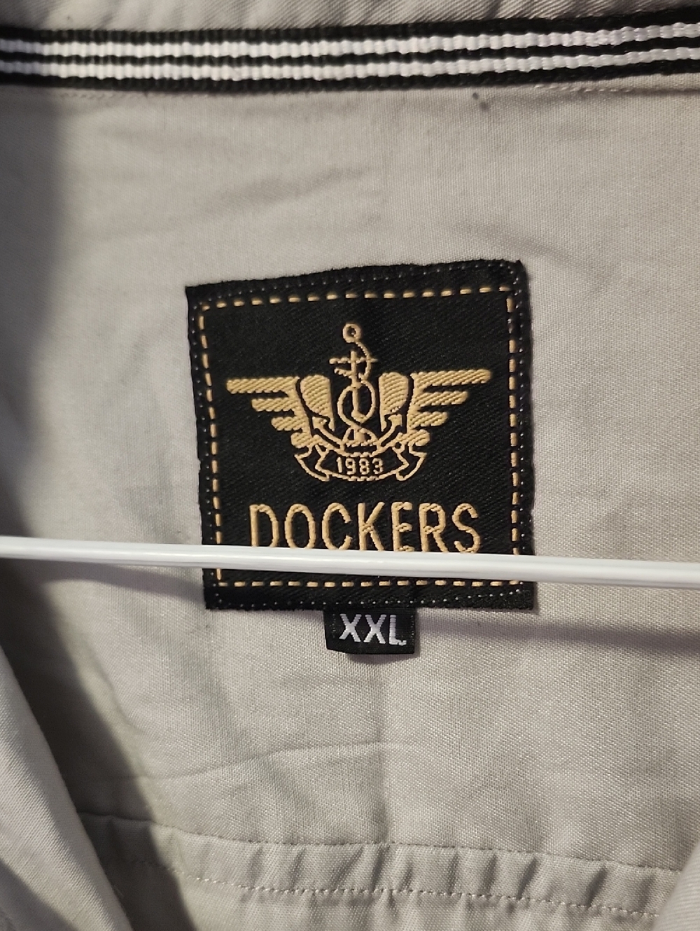 Dockers Light Beige Shirt with Black and Gold Patch